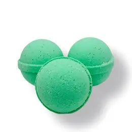 Three green spherical bath bombs made with natural ingredients, placed against a white background.