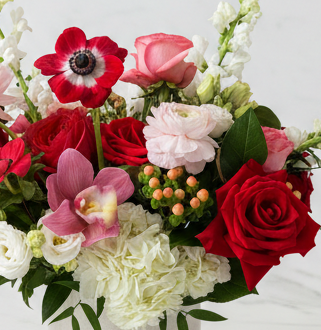 Valentine's Day floral arrangement in deluxe size using premium blooms