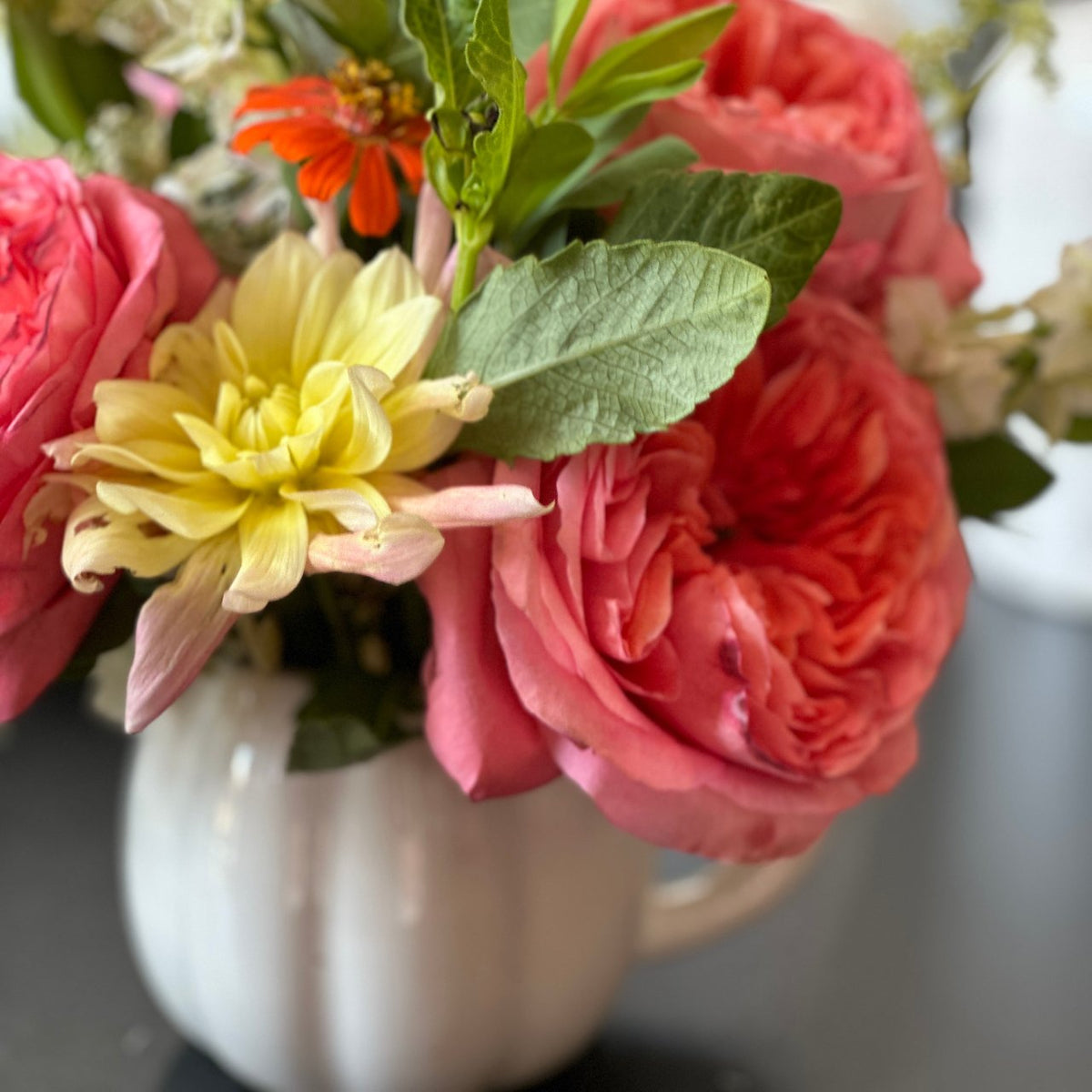 Flower filled white pumpkin mug