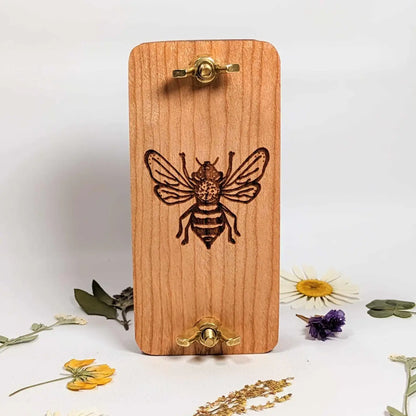 Miniature bee-embossed flower press