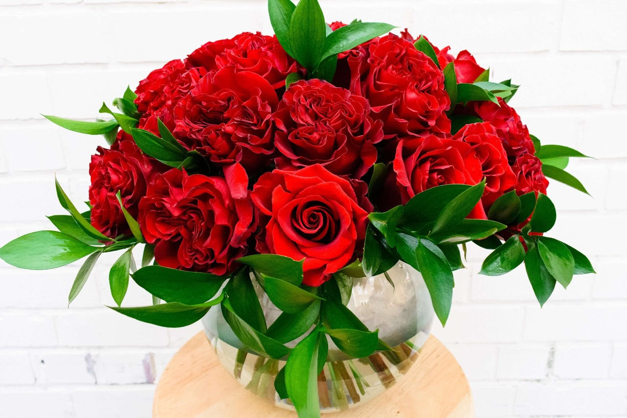 3 dozen red roses in a glass bubble bowl