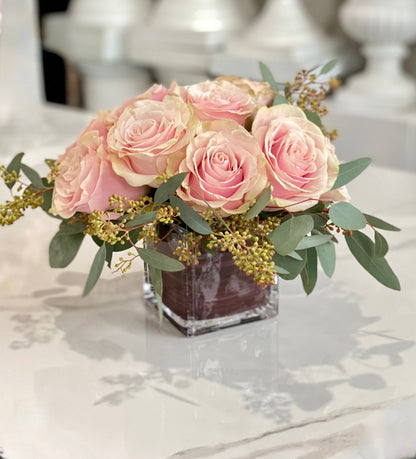We've captured the sweetness of love in an enchanting array of pink blooms. Perfect for new love or for love among friends.
