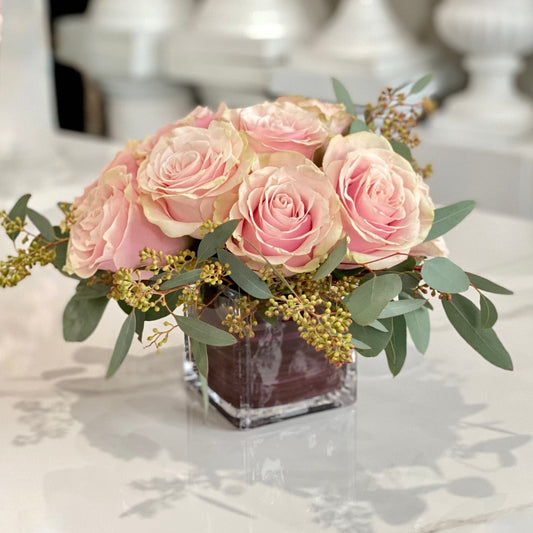 We've captured the sweetness of love in an enchanting array of pink blooms. Perfect for new love or for love among friends.