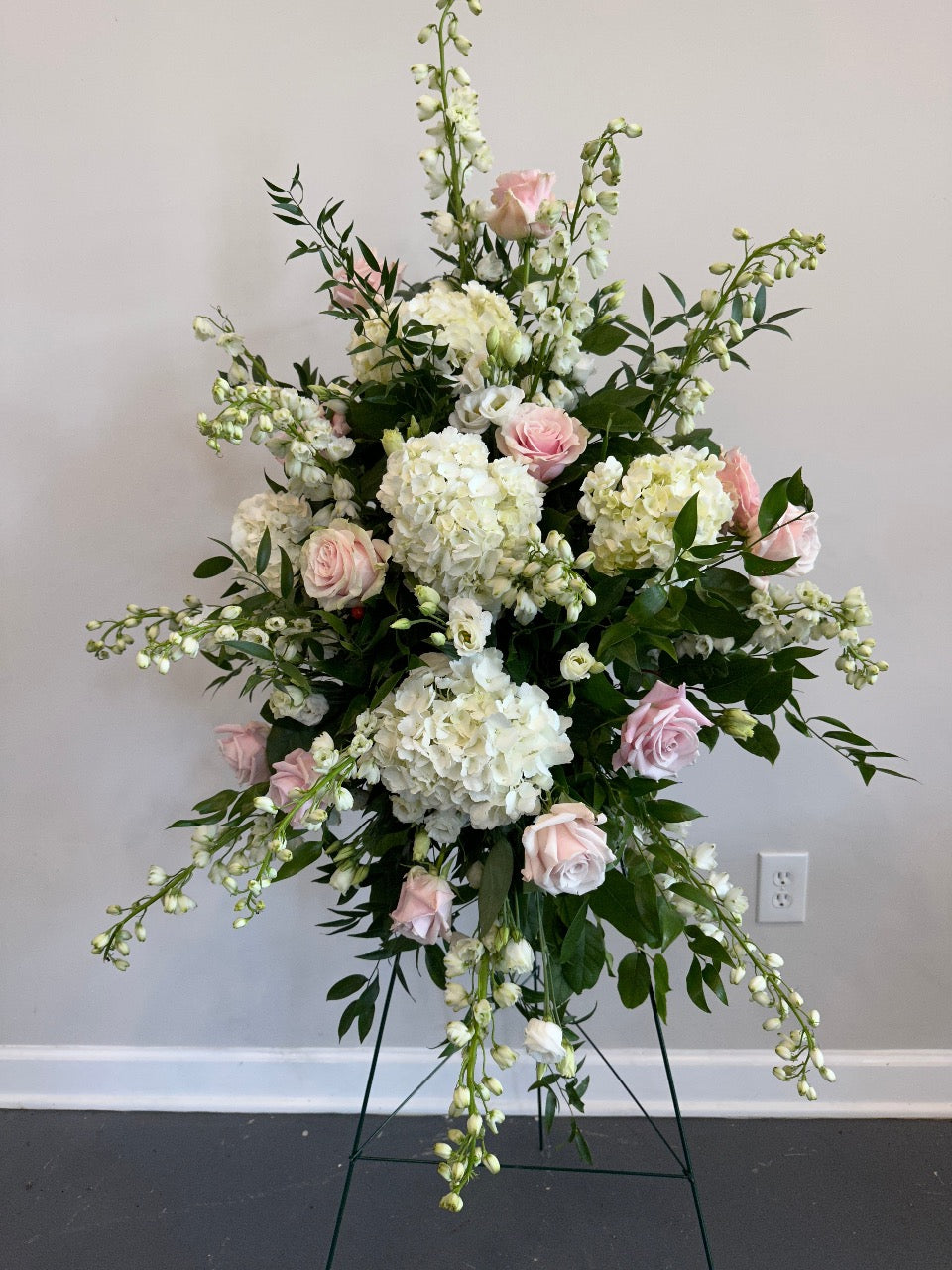 Funeral standing spray on easel