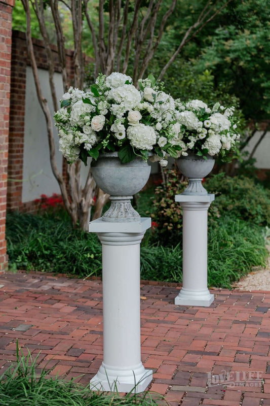 Classic wedding altar arrangements on pedestals for DC wedding