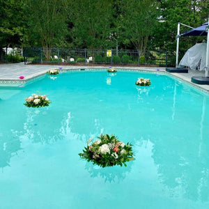 Floating flowers in a swimming pool